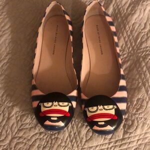 Really fun flats. Have a patent leather type finish.